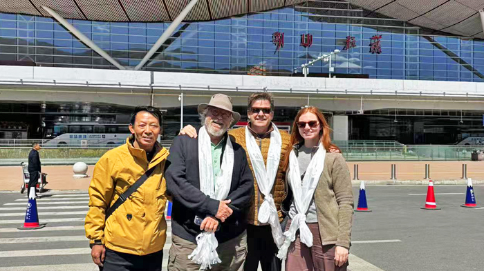 greets our guests at Lhasa Gonggar Airport