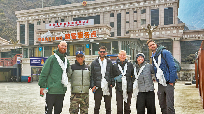 greets our guests with traditional white scarves at Gyirong Border