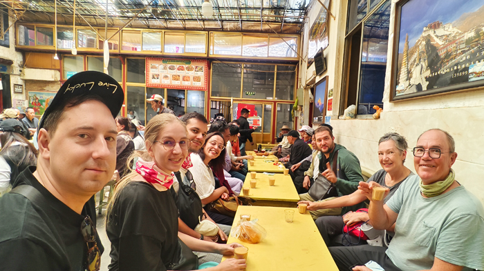 enjoy Tibetan sweet tea at a local tea house in Lhasa