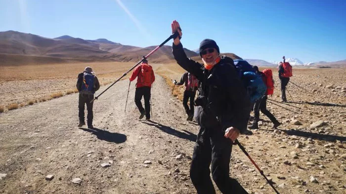 Elderly travelers trekking in Tibet