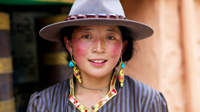 Tibetans usually use big hats for most of the time.