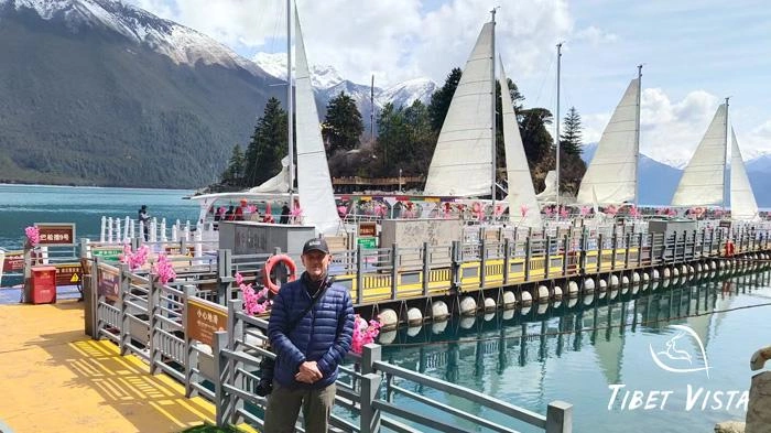 Our guests admire turquoise Basum Tso Lake before leaving Nyingchi