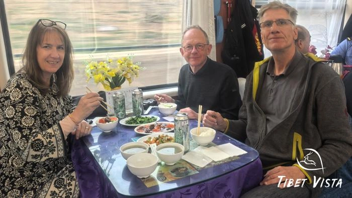 Our guests dine in the dining car of the Tibet train