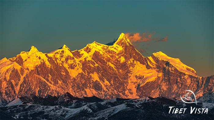 Golden sunrise over Namcha Barwa Peak in Nyingchi during winter