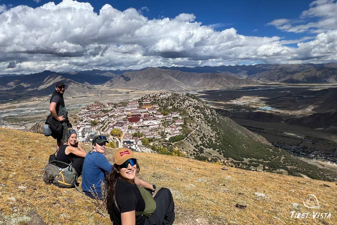 Admire photogenic ganden monastery from mountaintop