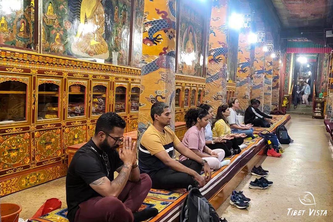 Meditate in Tibetan monastery in Lhasa