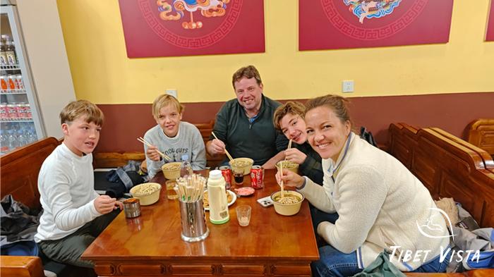 Our guests enjoy Tibetan noodles and Tibetan sweet tea at barkhor street