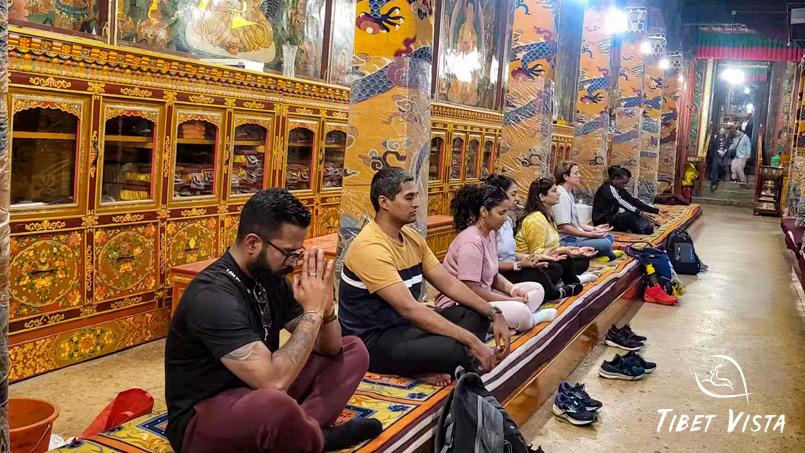 our guests meditate in main assembly hall