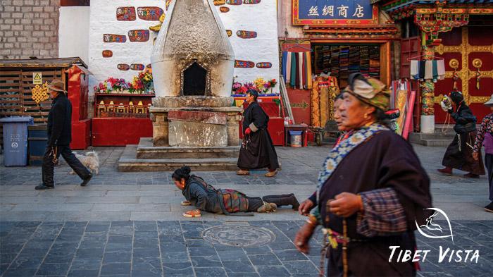 Pilgrims prostrating themselves on Barkhor Street
