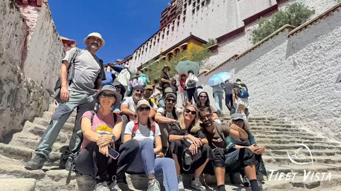 take a break on the stone steps of potala palace