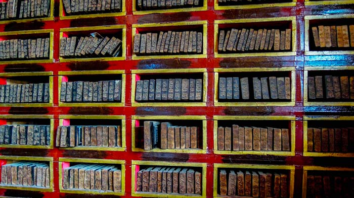 Blocks and plates remained on the wooden shelves in Sera Monastery
