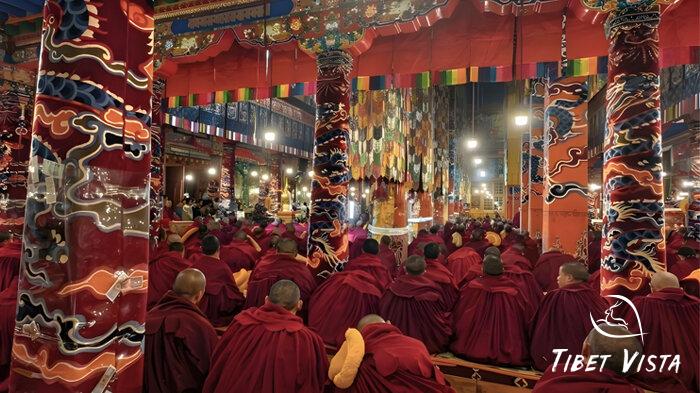 Tibetan monks having morning prayers in drepung monastery