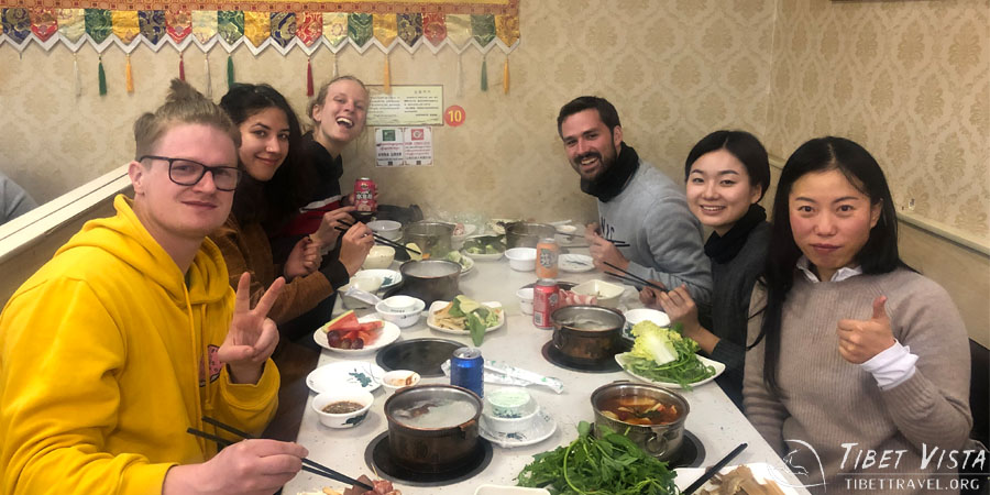 Our clients were happily enjoying the Tibetan hotpot in a local restaurant