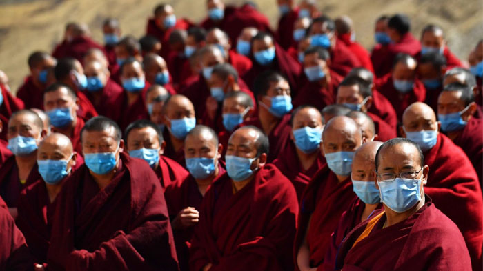 All the Tibetan monks were wearing masks