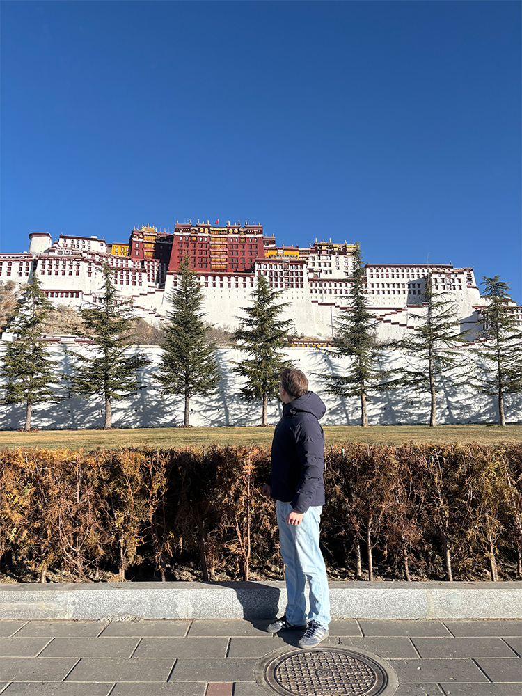 Tourists taking photos at Potala Palace