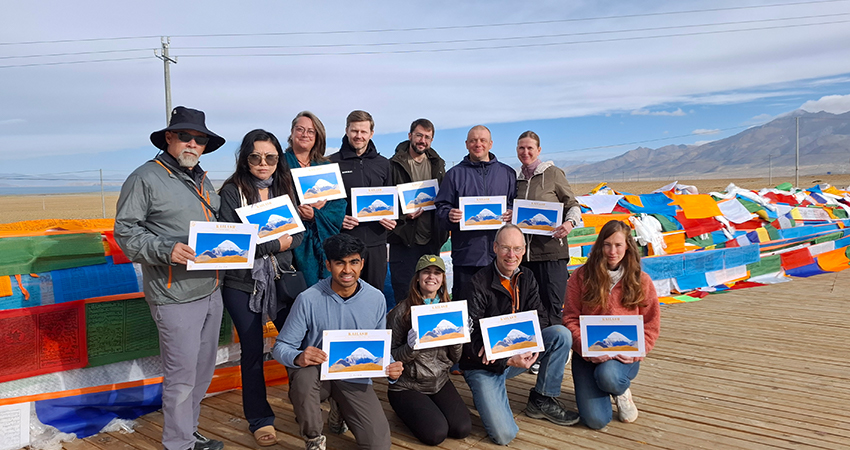 take a group photo after completing the Mt. Kailash trek