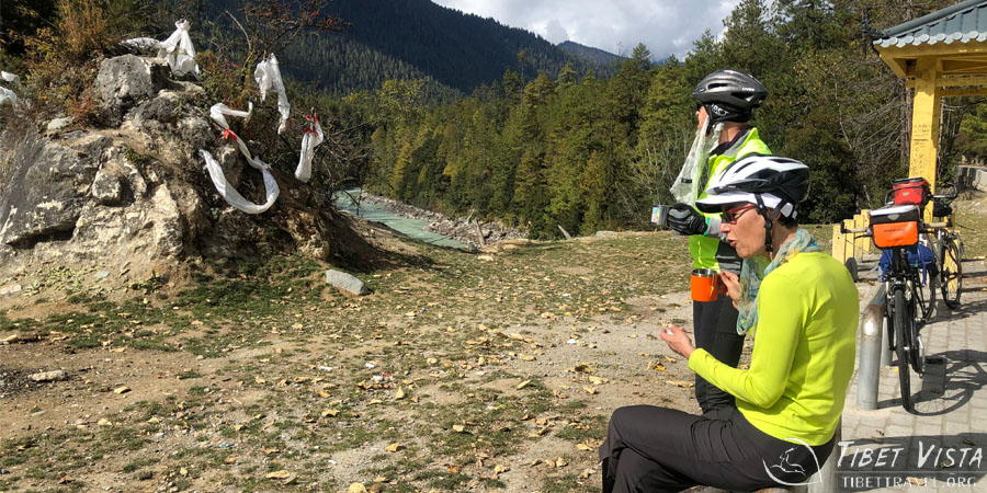 Cycling along the scenic roads through the mountains in Nyingchi