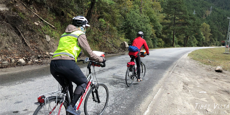 Cycling along the scenic roads through the mountains in Nyingchi