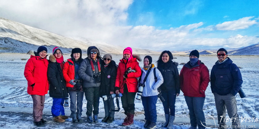 Hiking on the frozen icy ground of the kora around Mount Kailash