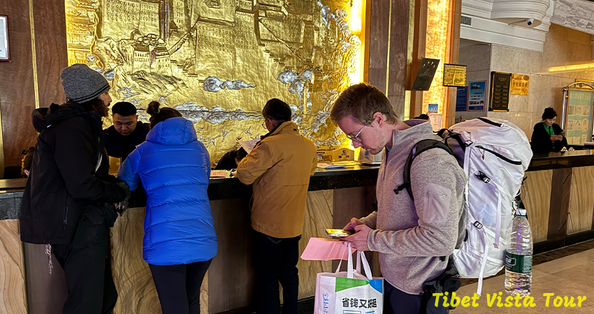 Our guide make sure guests complete the check-in process at the hotel