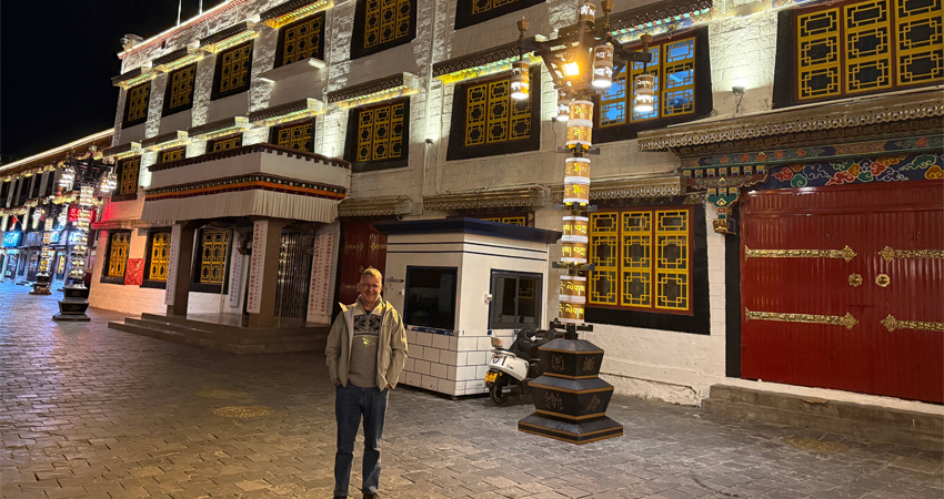 man on clean street in Lhasa at night