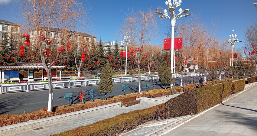 Lhasa winter street with Chinese flags