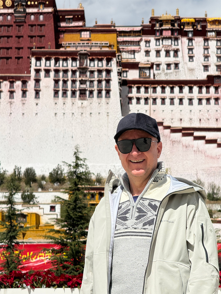man at Potala Palace square Lhasa