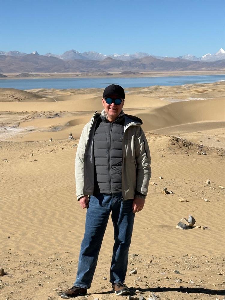 man at sand dunes near Mt Kailash