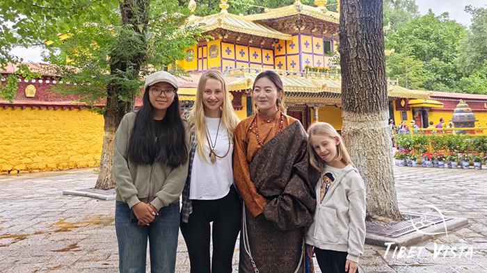 Our guests take photos with local Tibetans.
