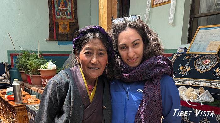 Our guests take photos with local Tibetans.