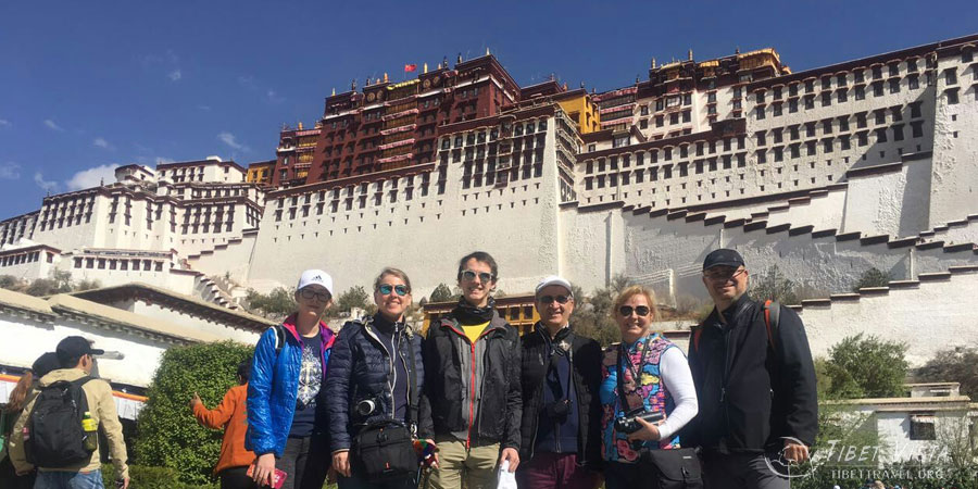 Taking a photo in front of Potala Palace