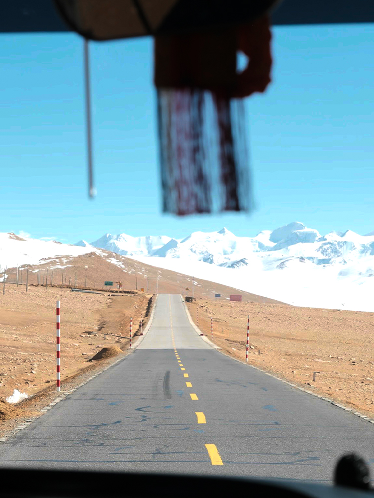 Scenic Tibet road trip landscape along mountain highway