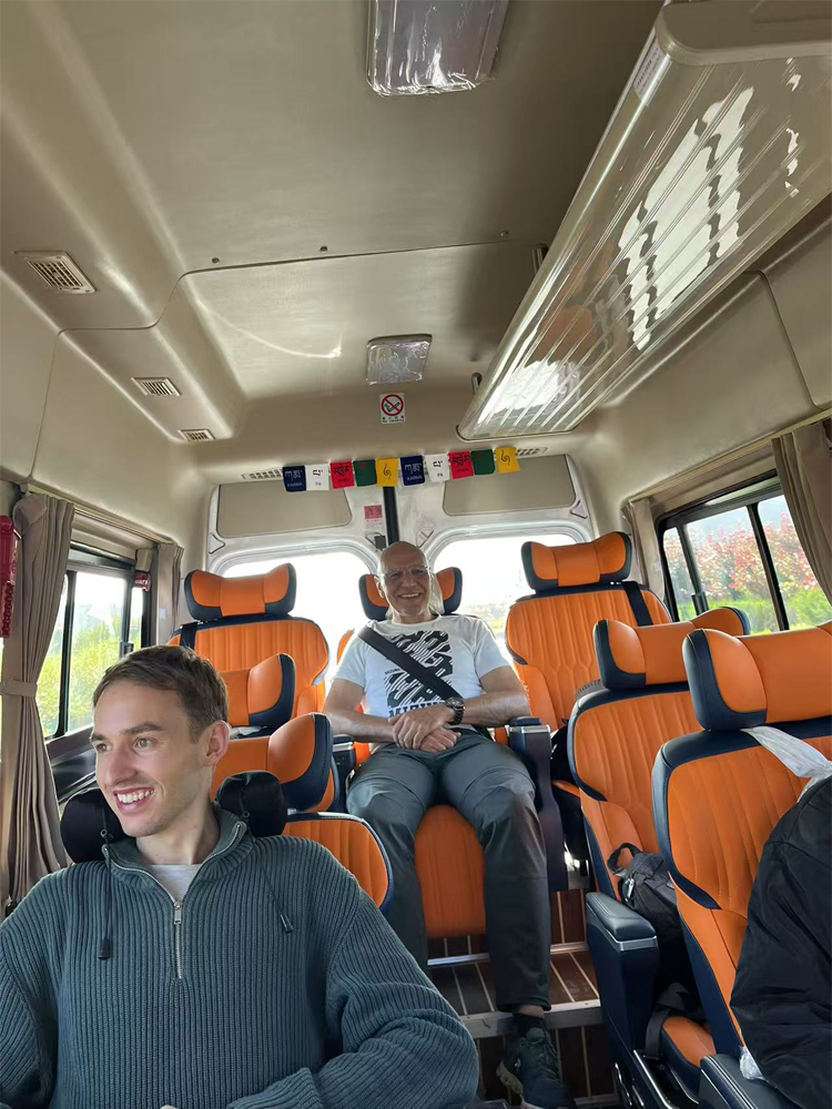 Comfortable tour van traveling on Tibetan Plateau