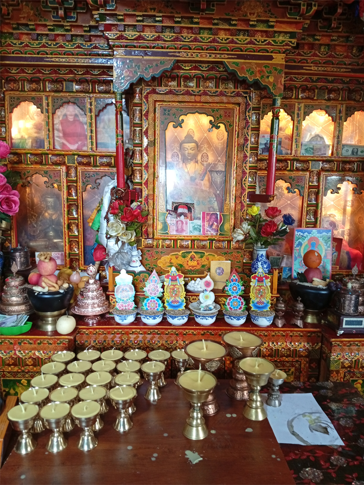Tibetan family restaurant altar in Shigatse