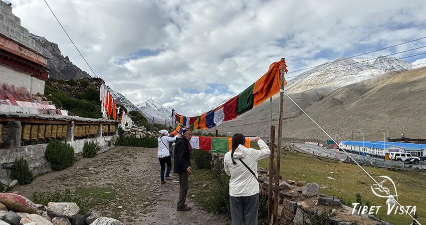Tourists placed several Tibetan prayer flags near Rongbuk Monastery