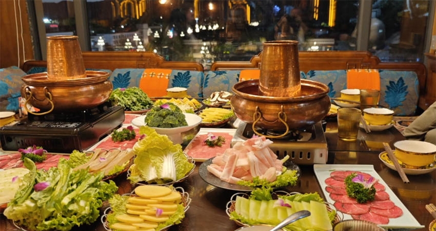 Tibetan yak hot pot with fresh vegetables and meat during welcome dinner in Lhasa