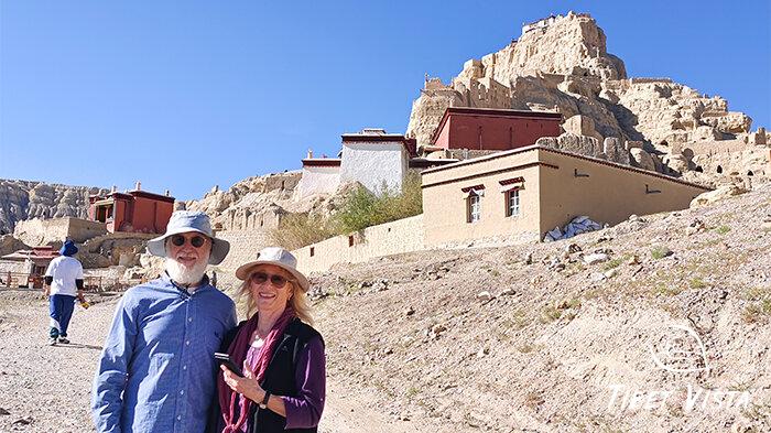 Our beloved guests take pictures in front of Guge kingdom ruins.