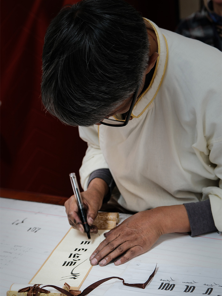 Learning Tibetan calligraphy writing characters in Lhasa Tibet