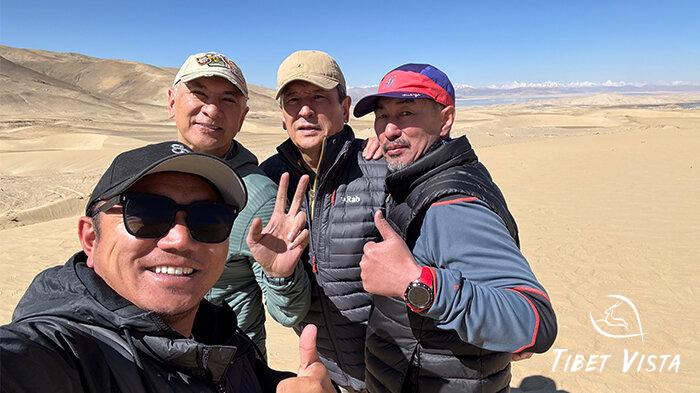 Taking photos by the stunning Lake Manasarovar.