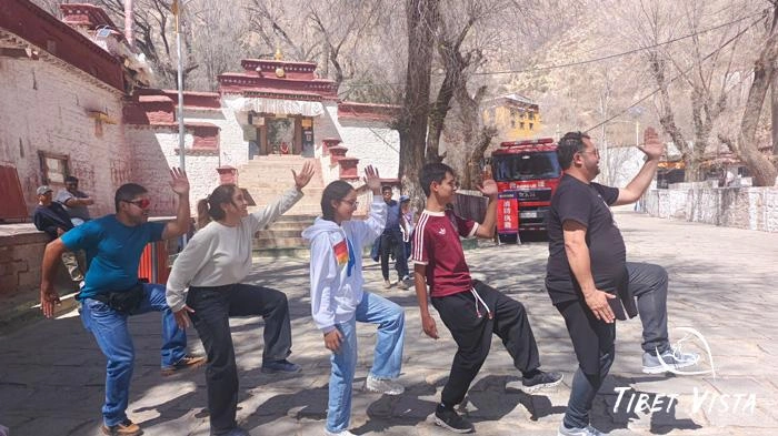 Our guest having great fun outside the Sera Monastery in Lhasa in April.