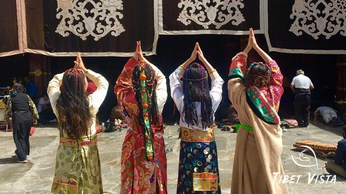 Explore Lhasa ancient streets and monasteries in Tibetan dress.