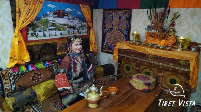 Wearing the Tibetan traditional dress to do the family visiting add extra fun to your Tibet tour.