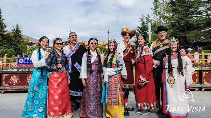 Group photo in Tibetan traditional dress in front of Jokhang temple.