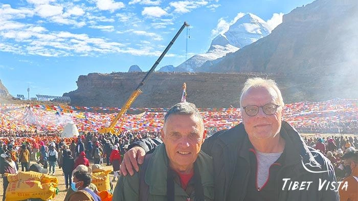 A new prayer flagpole is being raised as part of the sacred rituals celebrating the Saga Dawa Festival at Mount Kailash.