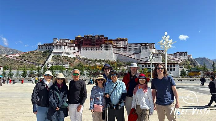 Our beloved guest in front of the Potala Palace this July.