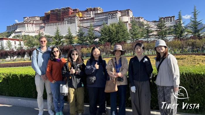 Group photo in front of the Potala Palace in August.
