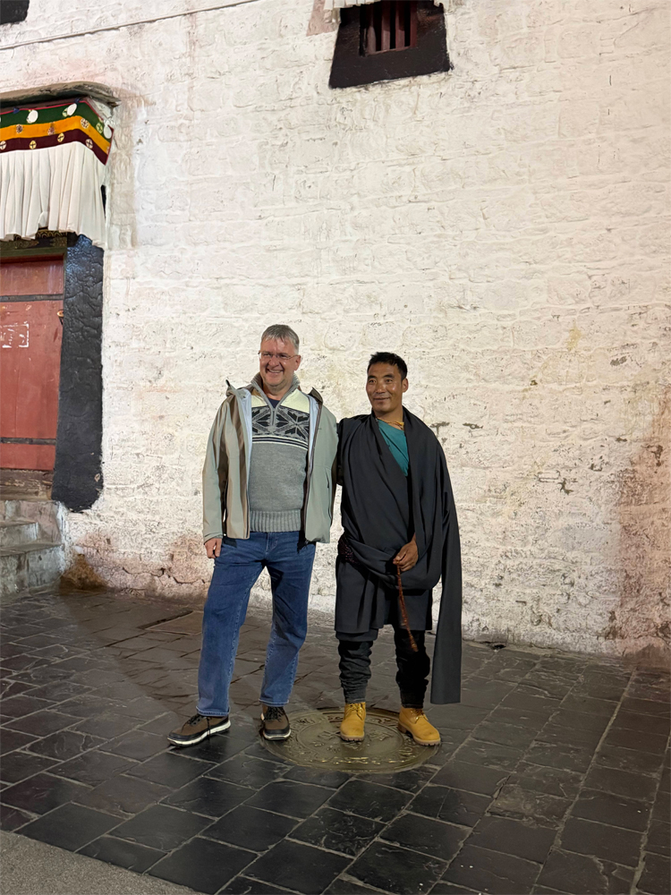 posing with welcoming Tibetan local
