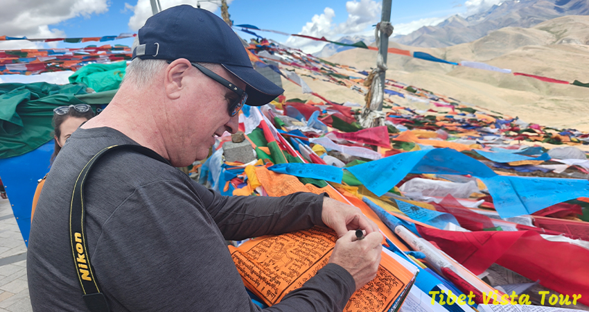 Write our wishes on Tibetan prayer flags