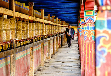Local Tibetans turnning prayer wheels in Trandruk Monastery