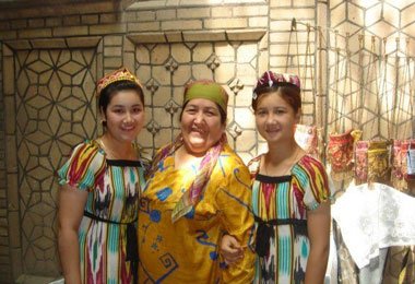 The hospitable Uyghur family welcome you to their family.